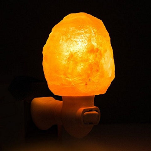 Natural Hand Carved Himalayan Salt Crystal Night Light at Dark